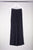 Weite Unisex-Hose mit elastischem Bund aus gecrashtem schwarzen Seidenstretch. KAYIKO Pure Black Kollektion – handgefertigte Avantgarde Designer Mode aus Wien| Wide unisex pants with elastic waistband in crashed black stretch silk. KAYIKO Pure Black Collection - buy handmade avant-garde designer fashion from Vienna